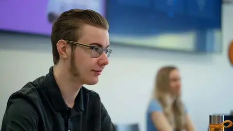 Two students in classroom.