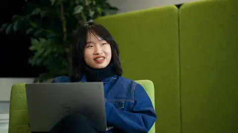 Student with laptop.